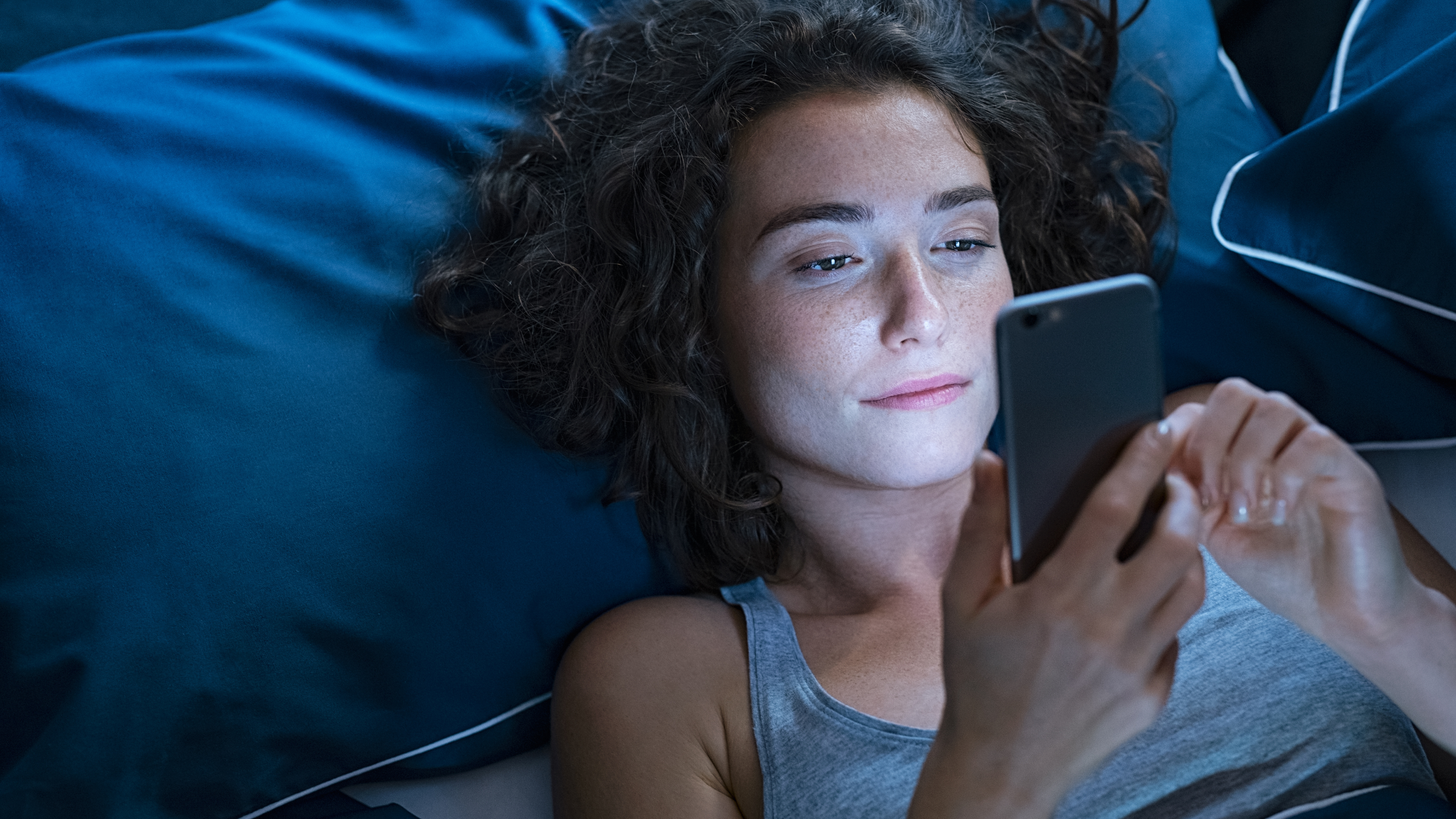 woman looking at phone